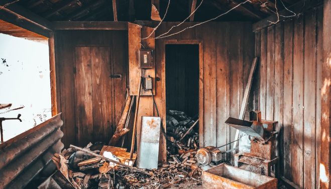 Old wooden room with garbage